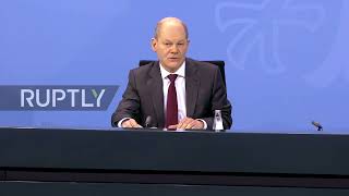 Germany: 'Omicron will keep us busy for a long time to come' - Scholz