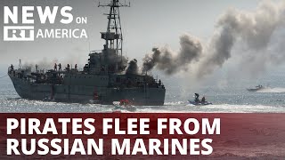 Yo-ho! Terrified pirates flee ship as Russian Marines save the day
