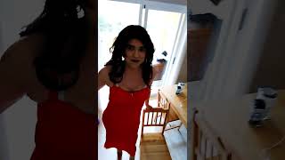 Francis crossdresser, cut red dress and extreme red high heels