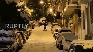 Greece: Athens local shows off ski skills on snow-covered street as severe weather hits country