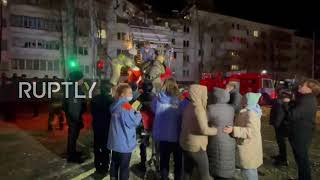 Russia: Rescuers pull injured teenager from rubble after residential bld explosion