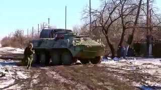 Fire fighting between militias and Ukrainian soldiers in Shyrokyne near Mariupol.