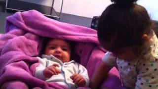 Pearl plays with Navroz....