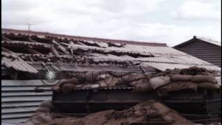Barracks and other buildings wrecked by mortar attacks at Bien Hoa Air Force Base...HD Stock Footage