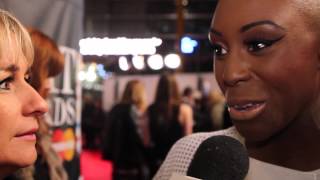Laura Mvula talks to heat on the Brit Awards 2013 red carpet