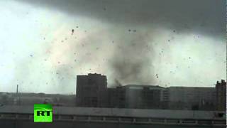 Amateur videos of powerful tornado that kills 1, injures dozens in Russia