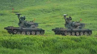 Japan's Mitsubishi Type 87 self-propelled anti-aircraft gun Oerlikon 35 mm twin cannon JGSDF