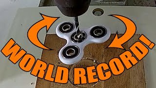 FIDGET SPINNER vs. DRILL PRESS | Longest spin ever