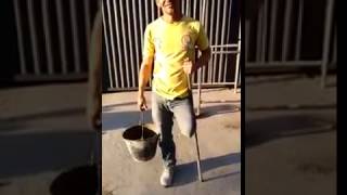 A man with only one leg doing construction job.