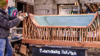 Sofa from an old bathtub. The transformation of bath into the sofa.