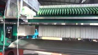 Auto washing plate and cloth filter press