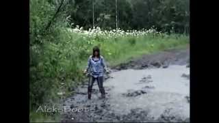 Girl Marina in rubber boots in the rain.(25/09/15)
