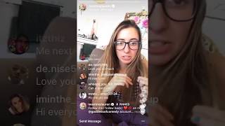 Lauren Francesca showing her belly button piercing