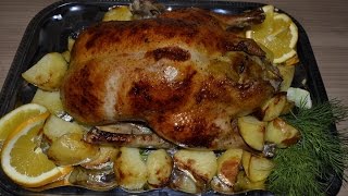 утка запечённая в духовке с картофелем и яблоками