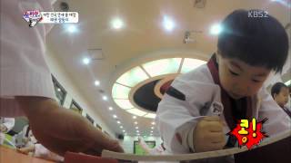 The triplets practice Taekwondo