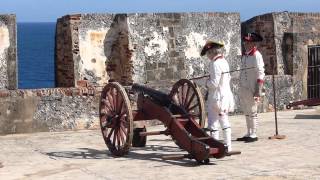 Spanish re-enactors firing a canon in Castillo San Felipe del Morro, San Juan, Puerto Rico