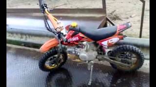 fast pit bike with flames