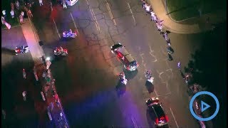 Hearse carrying John McCain's body arrives at funeral home