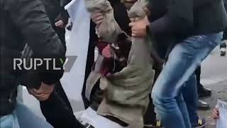 Italy: Extinction Rebellion demonstrators block road leading to Rome G20 site