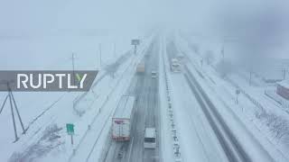 Japan: Drone footage captures traffic on snow-covered roads in Shiga prefecture