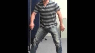 Young boy twerking at work