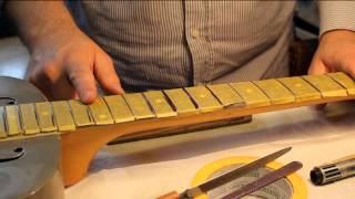 Repairing and leveling lifting frets on an old Dobro guitar and making a new nut