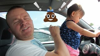 Dad changes poopy diaper at the airplane museum E21