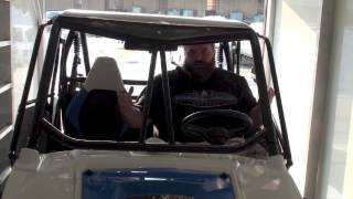 Polaris Patented Gull Wing RZR Drs by MARSHALL MOTOART and exiting inside a trailer