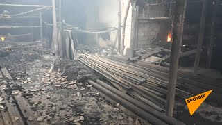 Поврежденный магазин стройматериалов в Степанакерте.