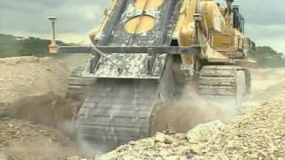 очень Большые Машины монстры вгрызаются в горную породу Machinery monsters bite into the rock