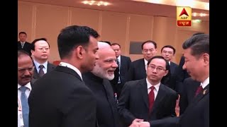 PM Modi and Chinese President Xi Jinping shake hands at BRICS informal meeting in Hamburg