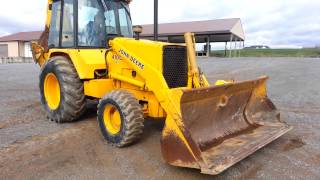 John Deere 410C,4x4,extenda hoe!
