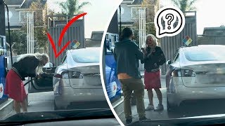 Блондинка пытается заправить электромобиль - приколы года?