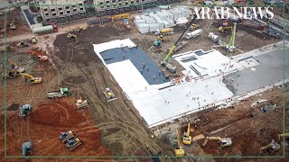 China virus: Workers build new hospital in Wuhan