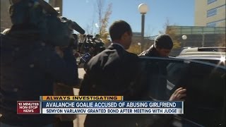 Goalie travels with team despite charges