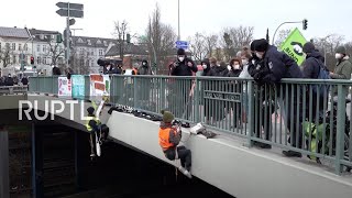 Germany: Berlin autobahn bridge blocked by abseiling climate activists