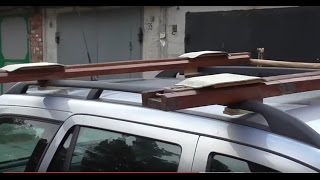 Моторная лодка на рейлингах авто. Приспособление для погрузки и выгрузки.