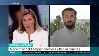Taliban overrun Afghan army base, killing 17 troops