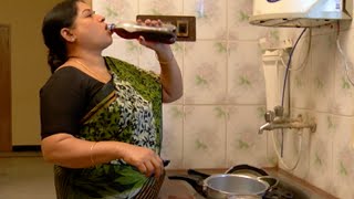 'Deivam' Athai gulps alcohol !!!