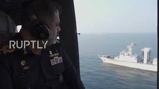 At Sea: Iranian soldiers conduct joint naval drills with China, Russia