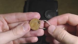 Монетка для тележек в супермаркете