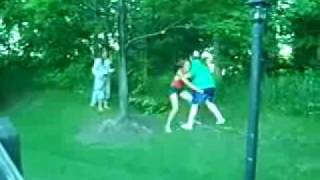 Girl grabs guys nuts from behind