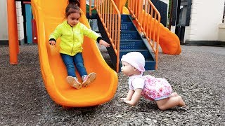Walking Baby Doll at Playground /