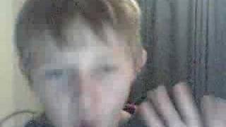 Little boy testing his new webcam out