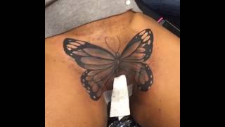 Butterfly on her vagina by Phor from Black Ink Chicago