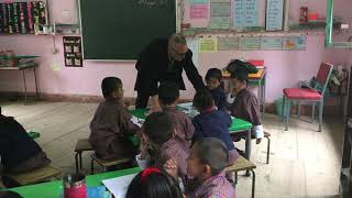 Mr. Booth drawing with elementary students IMG 0071