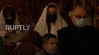 State of Palestine: Worshippers hold Orthodox Christmas mass at Gaza church