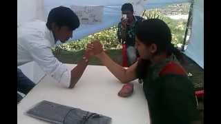 Arm wrestling Between boy and girl
