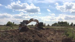 Экскаватор Caterpillar 324 dl и бульдозер Caterpillar D6R на объекте