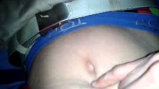 Playing His Belly Button